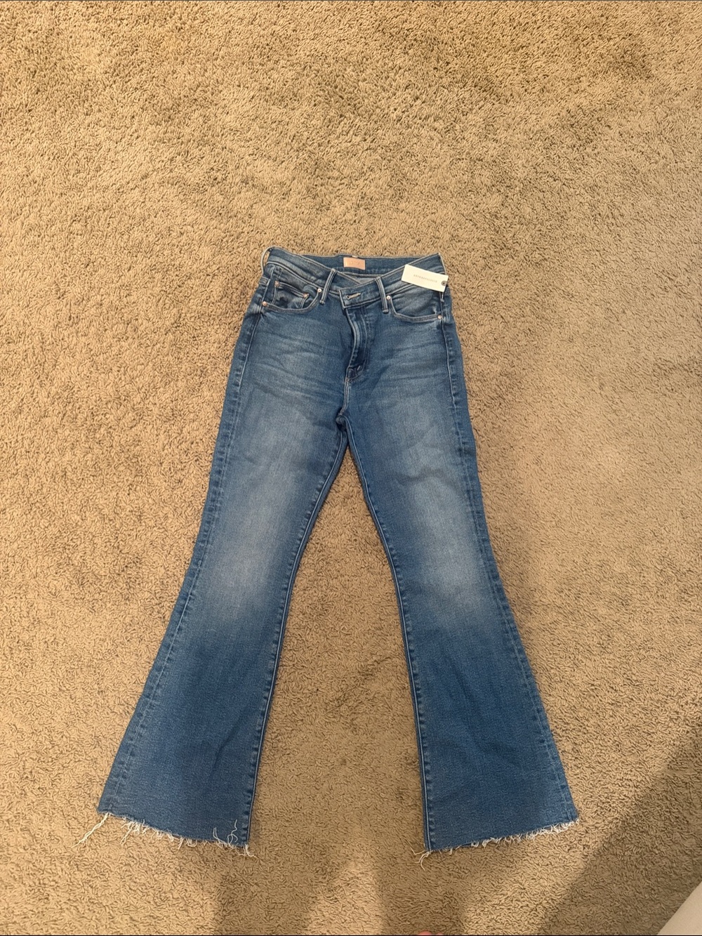 MOTHER Mid Blue Flare Jeans with Raw Hem